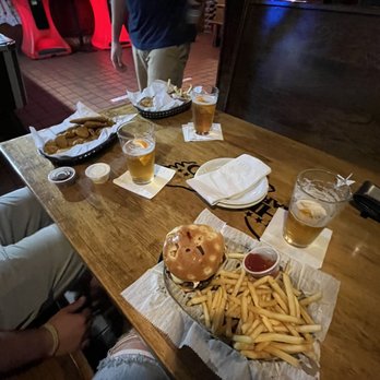 The Bird Bar & Grill - a table full of food - Bars Near Me - Mount Pleasant, Michigan
