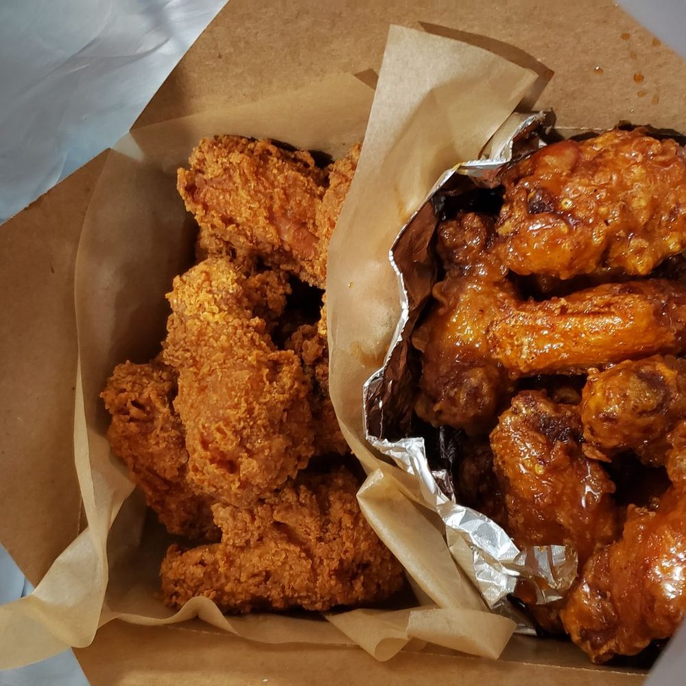 Kokio Chicken - Take out bagged 20 piece wings, opened to vent heat - Chicken Wings Near Me - Katy, Texas