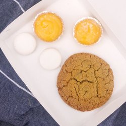 High Tea Bakery - Lemon tarts, mini imperials and a peanut butter chocolate chip cookie.