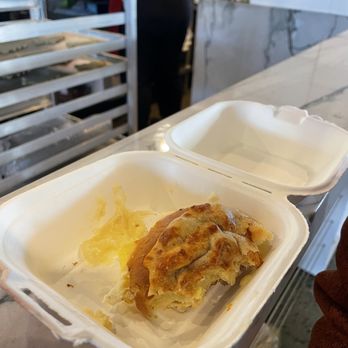 Mercurys Coffee - The egg and cheese sandwich that's being demolished - Coffee & Tea Near Me - Bellevue, Washington Mercurys Coffee - The egg and cheese sandwich that's being demolished - Coffee & Tea Near Me - Bellevue, Washington