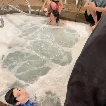 Comfort Suites Redding - Shasta Lake - Hot tub with a covered equipment on the side. - Hotels Near Me - Redding, California