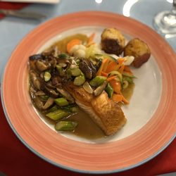 Caffe Milano Restaurant - Salmon with asparagus, mushrooms, assorted vegetables and potatoes