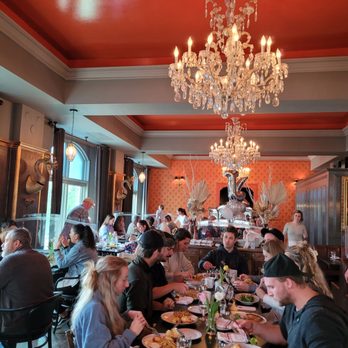 Cafe Bouffon - a large group of people eating - French Near Me - Stratford, Ontario Cafe Bouffon - a large group of people eating - French Near Me - Stratford, Ontario