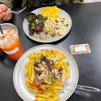 Papa's Got Jerk - two plates of food on a table - Chicken Shop Near Me - St. George, Utah Papa's Got Jerk - two plates of food on a table - Chicken Shop Near Me - St. George, Utah