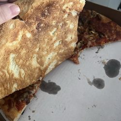 Raw pizza and uncut