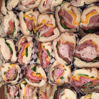 Crostini Sandwiches - Large "subs in a box" catering order - tasty but no veggie choices. - Sandwiches Near Me - Madison, Wisconsin Crostini Sandwiches - Large "subs in a box" catering order - tasty but no veggie choices. - Sandwiches Near Me - Madison, Wisconsin