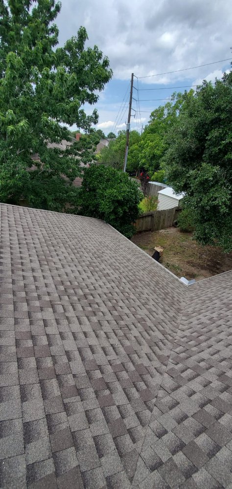 Slide of Truly Roofing & Construction