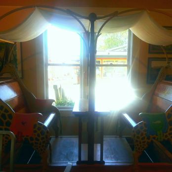 Arcata Scoop - Vintage giraffe carousel swing. Mega cute. Wish I coulda sat in it though. - Ice Cream & Frozen Yogurt Near Me - Arcata, California