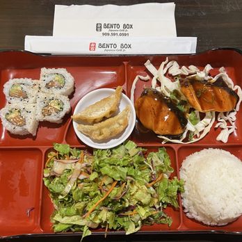 Bento Box Japanese Grill - Bento box with salmon teriyaki and a Philadelphia roll with no cream cheese - Japanese Near Me - Chino, California Bento Box Japanese Grill - Bento box with salmon teriyaki and a Philadelphia roll with no cream cheese - Japanese Near Me - Chino, California