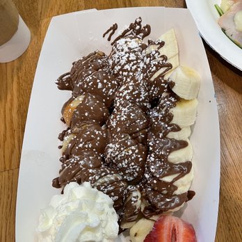 Fraise Cafe - Mini Pancake Minis (12 Pieces) (we added our strawberries to the pick). Nutella with bananas on top - Creperies Near Me - Fullerton, California