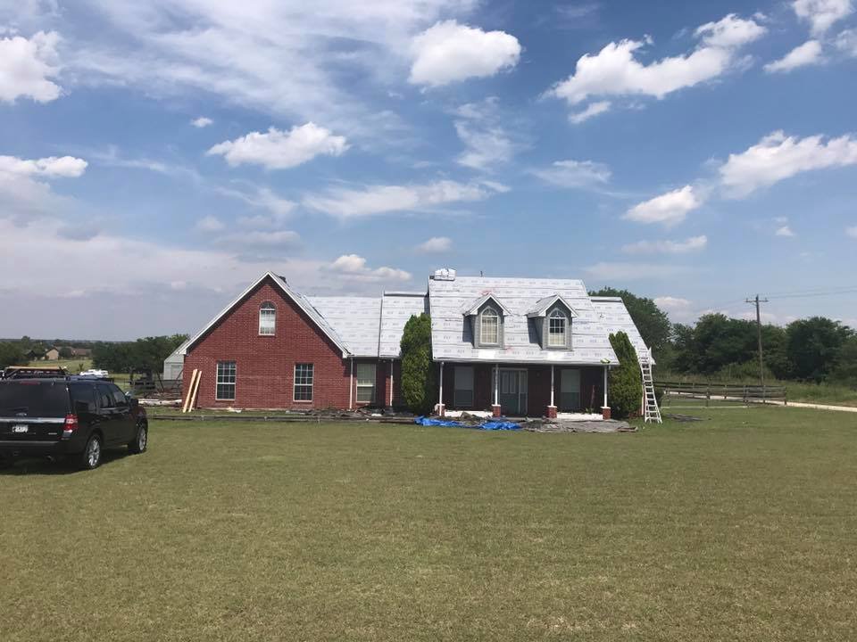 Slide of Cowboys Roofing