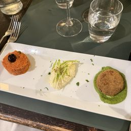 Trio of traditional starters: Panzanella, Baccalà mantecato, Polpetta di bollito