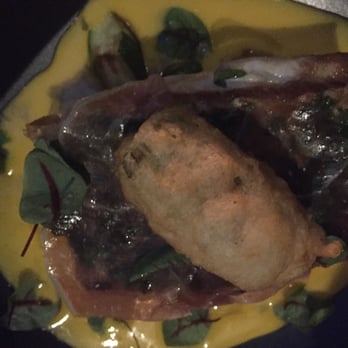 Spoon and Stable - Sea bass was delicious and this pic doesn't do it justice. Under that crispy thing, tasty skin and prosciutto is a big piece of fish. - New American Near Me - Minneapolis, Minnesota