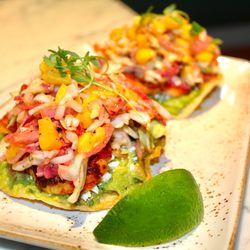 Kachina Cantina - The Shrimp Tostada is made with shrimp, corn tostada, guacamole, cotija, & slaw.