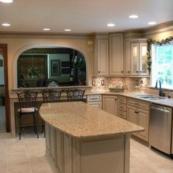 Dr. House Properties - Off white with chocolate glazed cabinets and quartz countertops