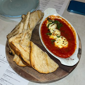 Sixty Vines - BAKED RICOTTA
house made ricotta, herb roasted san marzano tomato sauce, basil, toasted crostini -$9 - New American Near Me - Dallas, Texas Sixty Vines - BAKED RICOTTA
house made ricotta, herb roasted san marzano tomato sauce, basil, toasted crostini -$9 - New American Near Me - Dallas, Texas