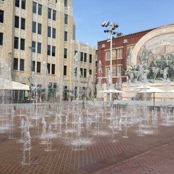 Sundance Square - Plaza with the fountains and beautiful mural - Shopping Centers Near Me - Fort Worth, Texas Sundance Square - Plaza with the fountains and beautiful mural - Shopping Centers Near Me - Fort Worth, Texas