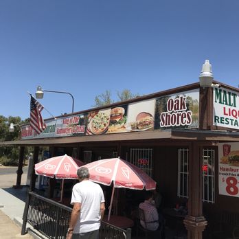 Oak Shores Malt Shop - A couple tables outside to enjoy your meal. - Grocery Near Me - Campo, California