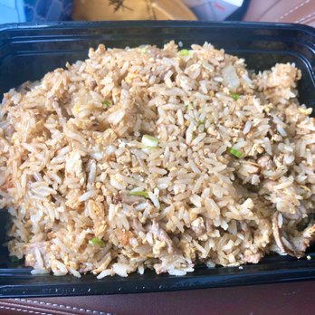 Fire wok - rice and meat in a plastic container - Asian Fusion Near Me - Centralia, Illinois