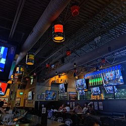 The Canadian Brewhouse & Grill - Main dining area. Many TV screens!