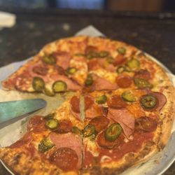 Tailgaters - 16 " Canadian bacon, pepperoni, jalapeño and garlic. Yes, add garlic!!