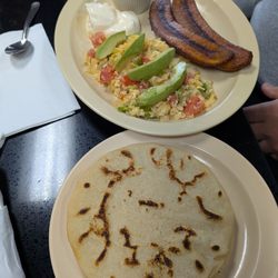 Restaurant Salvadoreno Usuluteco - Desayuno típico with fried plantains, scrambled eggs, refried beans, sour cream, and handmade corn tortillas