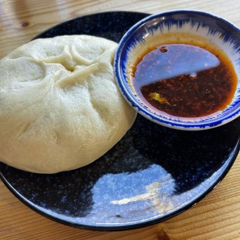 Rose's - Vegetarian steamed bun - Curry squash, yellow pea filling with chili oil on the side - Desserts Near Me - Durham, North Carolina Rose's - Vegetarian steamed bun - Curry squash, yellow pea filling with chili oil on the side - Desserts Near Me - Durham, North Carolina