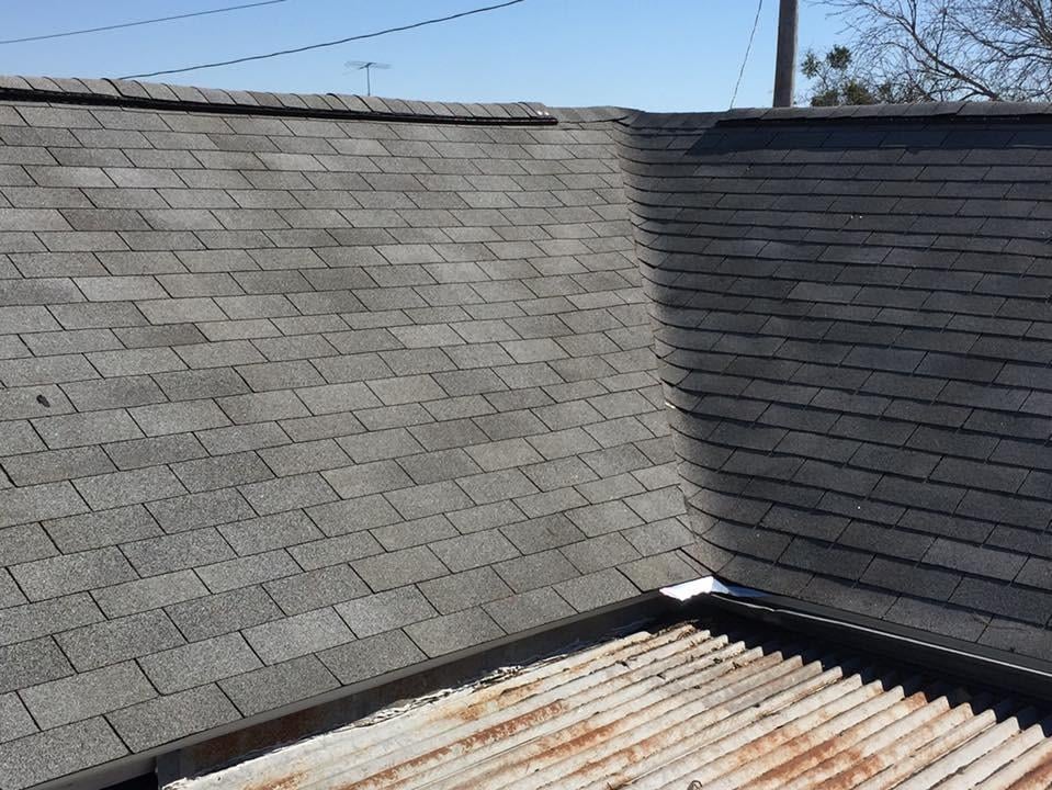 Slide of Tim's Roofing