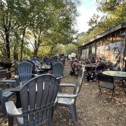 Crisis Brewing Company - Outside patio seating under the trees