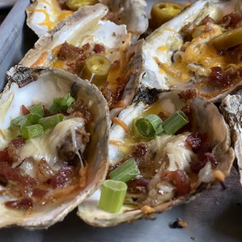 Shuckin' Shack Oyster Bar - Chargrilled Oysters (Jalpeno Cheddar and Parmesan Garlic, both topped with Bacon) super tasty but small. - Seafood Near Me - Cumming, Georgia Shuckin' Shack Oyster Bar - Chargrilled Oysters (Jalpeno Cheddar and Parmesan Garlic, both topped with Bacon) super tasty but small. - Seafood Near Me - Cumming, Georgia