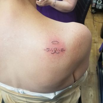 Cowpok - A memorial tatoo for my passed kitties. Eric did a wonderful job and was very sympathetic! I would highly recommend Eric or cowpok! - Piercing Near Me - Buffalo, New York
