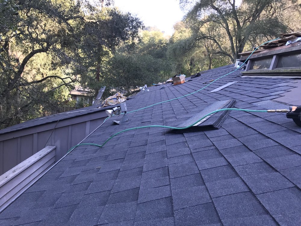Slide of T D Roofing