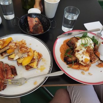 Miss Jackson - Coconut waffles with passion fruit, banans, mango and honeycomb...with a side of pork belly. To the right is the pork belly waffle combo. - Cafes Near Me - St Kilda, VIC Miss Jackson - Coconut waffles with passion fruit, banans, mango and honeycomb...with a side of pork belly. To the right is the pork belly waffle combo. - Cafes Near Me - St Kilda, VIC