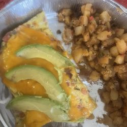 South of the border omelette  onions, tomatoes and peppers and chorizo. Sausage topped with ripe avocado and cheddar cheese.