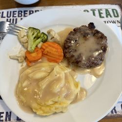 Mom & Tina's Bakery - Salisbury steak with Mashed potatoes.