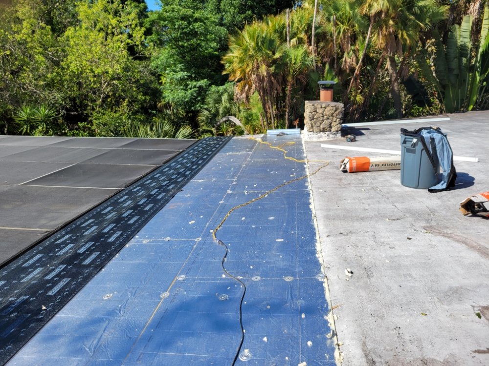 Slide of Murphy's Coastal Roof Solutions