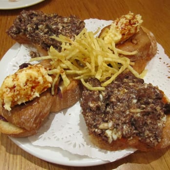 Casa Lucas - 2 hot Pinchos, Madrid (blood sausage) and Alella (chicken with corn and onion) - Tapas Bars Near Me - Madrid, M