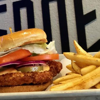 Hometown Heroes - Our Iowa pork tenderloin with sweet pickles! - Sports Bars Near Me - Grinnell, Iowa