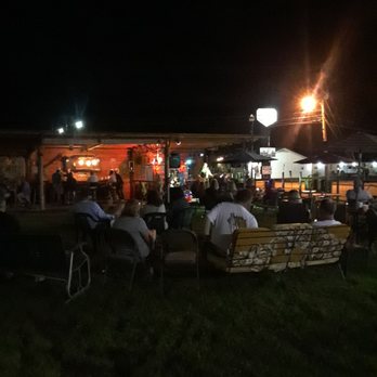 The Rabbit Hole - people sitting outside at night - Pubs Near Me - Elba, Alabama The Rabbit Hole - people sitting outside at night - Pubs Near Me - Elba, Alabama
