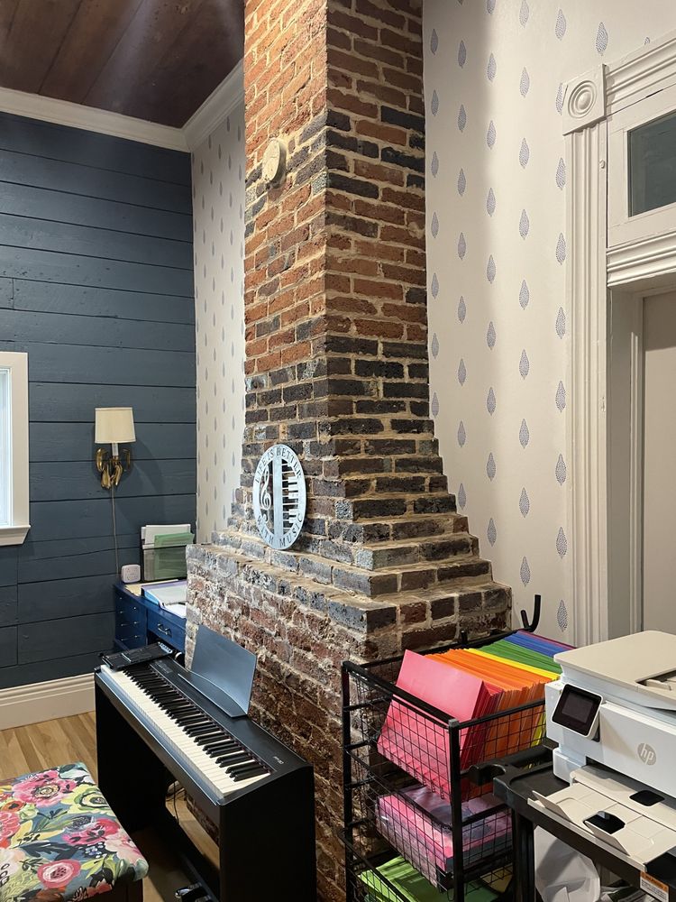 Slide of Moore Roofing and Construction