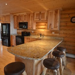Pinewood Lodge Estate - East end kitchen is brand new in the pinewood. Granite counter tops and bar style seating right along the lake side of the lodge.