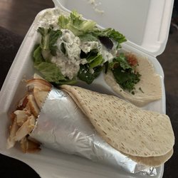 Albasha Express - Chicken Shawarma Sandwich with a side salad and hummus