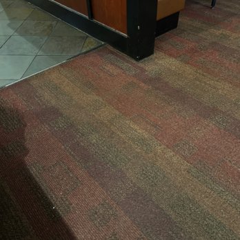 LongHorn Steakhouse - This is the carpet up front as you come in. This is a huge source of horrible smells, and is terribly dirty. New management is needed!!! - Steakhouses Near Me - Concord, New Hampshire LongHorn Steakhouse - This is the carpet up front as you come in. This is a huge source of horrible smells, and is terribly dirty. New management is needed!!! - Steakhouses Near Me - Concord, New Hampshire