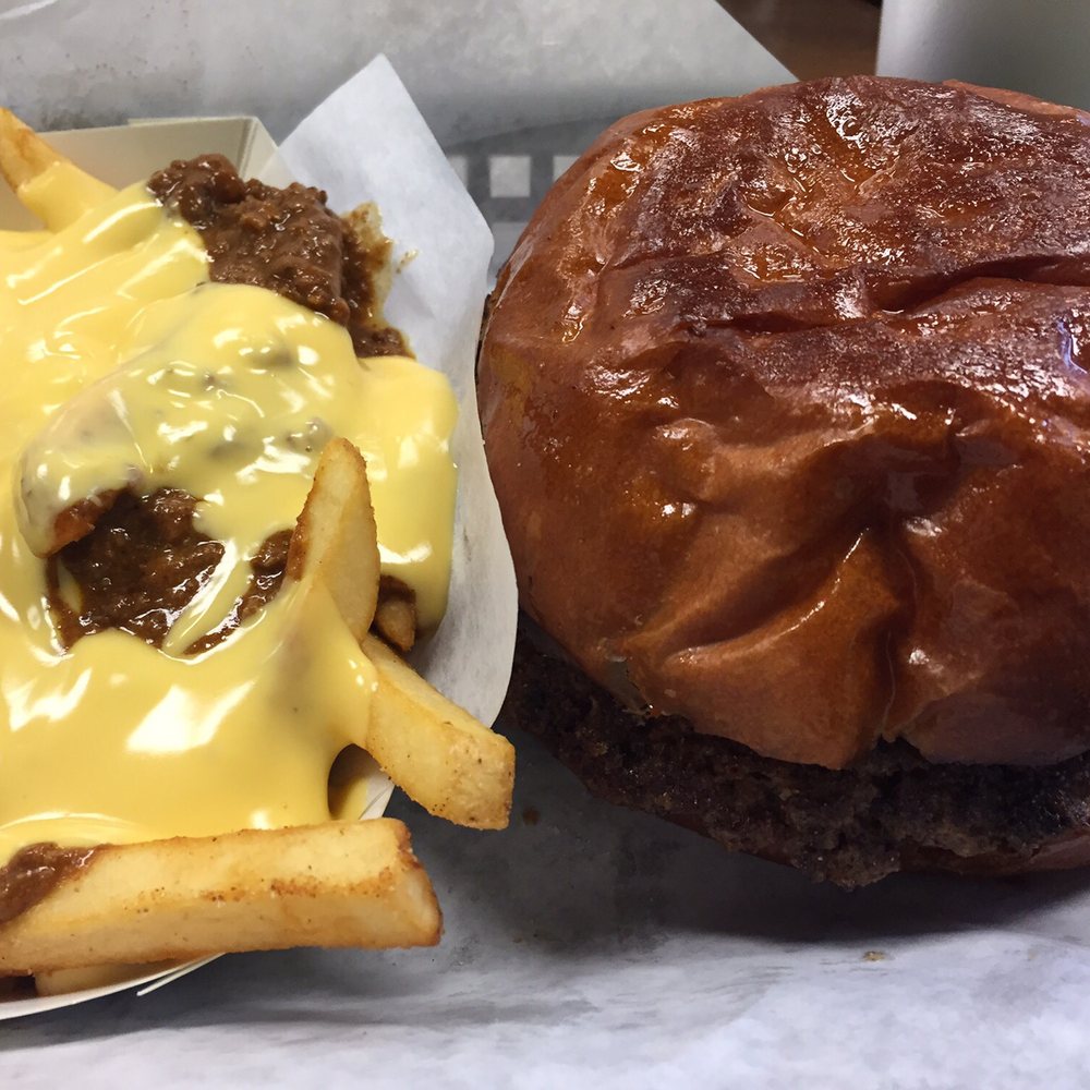 JLB Eatery - Chili cheese fries. Not a big fan of the nacho cheese. The burger bun was croissant like lending points to the otherwise average burger. - Burgers Near Me - Tomball, Texas