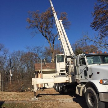 Accurate Tree and Landscaping - a white utility truck - Tree Services Near Me - Ferguson, Missouri