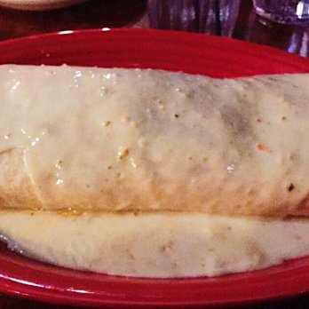 El Palenque - The HUGE Super Burrito topped with the Suizo sauce - Mexican Near Me - Eastlake, Ohio El Palenque - The HUGE Super Burrito topped with the Suizo sauce - Mexican Near Me - Eastlake, Ohio