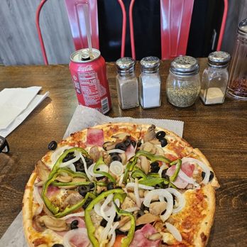 Singas Famous Pizza - Pizza Near Me - Corona, New York Singas Famous Pizza - Pizza Near Me - Corona, New York