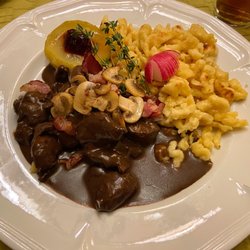 Alpfrieden - Pepper venison with mushrooms, spätzli, baked apple and cranberries.