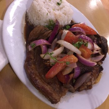 Mistik Peruvian Restaurant - Steak, sauce, white rice, onions, peppers - Peruvian Near Me - Bridgeport, Connecticut