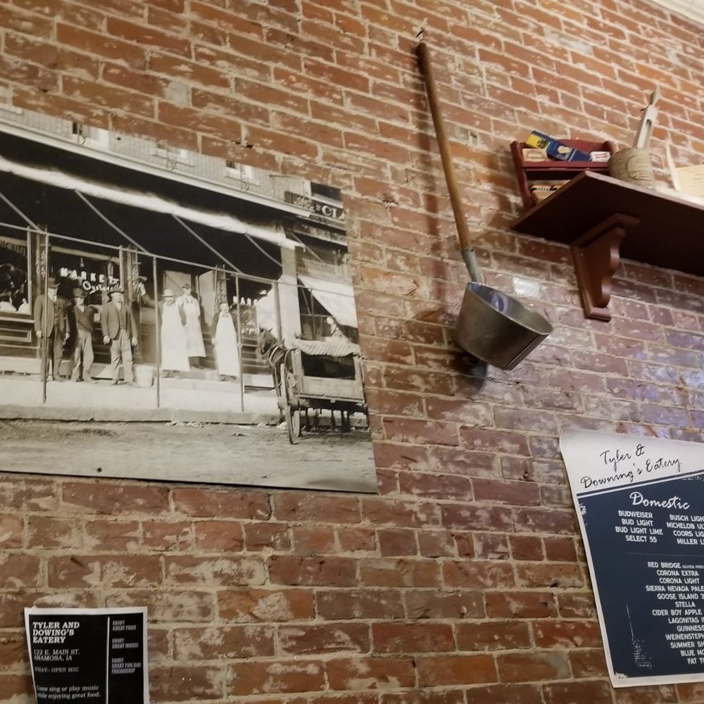 Tyler & Downing's Eatery - Memorabilia from when the building functioned it was a store. - American Near Me - Anamosa, Iowa Tyler & Downing's Eatery - Memorabilia from when the building functioned it was a store. - American Near Me - Anamosa, Iowa